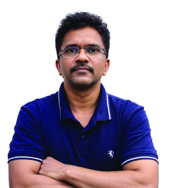 Mithun - Founder of Omcarve Laser Crafts creating personalized laser engraved artwork